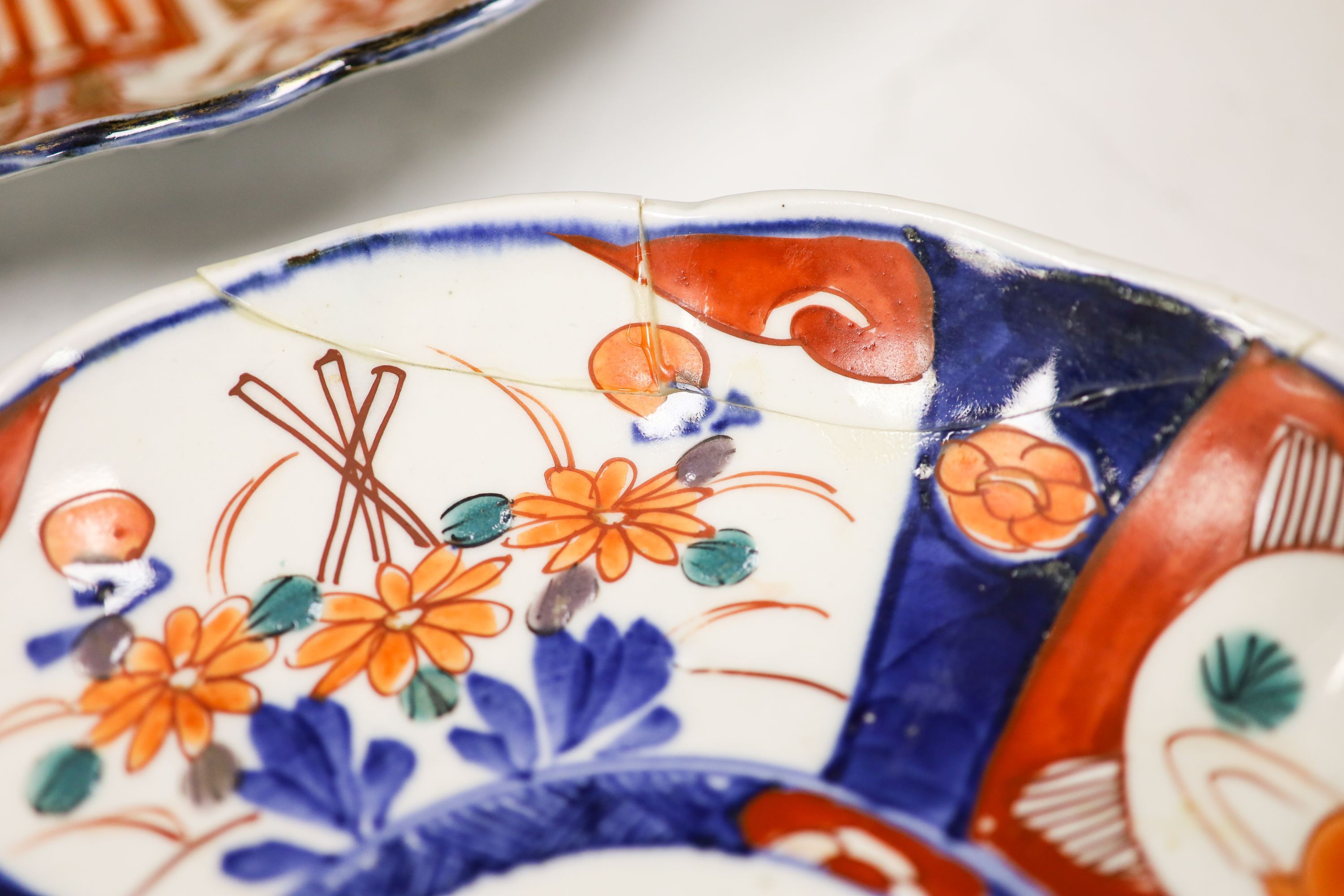 Five Japanese Imari dishes, largest 30.5 cm